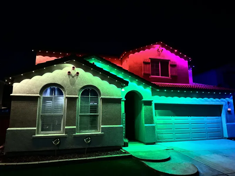 San Diego home with colorful permanent LED roofline lighting installed by SeaBreeze Home Service